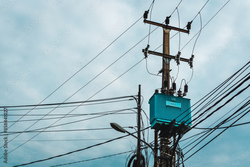 Pole-mounted distribution transformer used to provide Pole-mounted distribution transformer used to provide