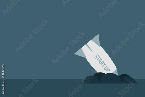 Business startup failure concept, broken rocket on floor