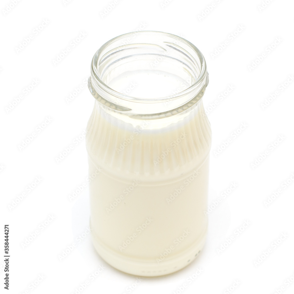 Small milk bottle isolated on white background.Baby milk product Small milk bottle isolated on white background.Baby milk product