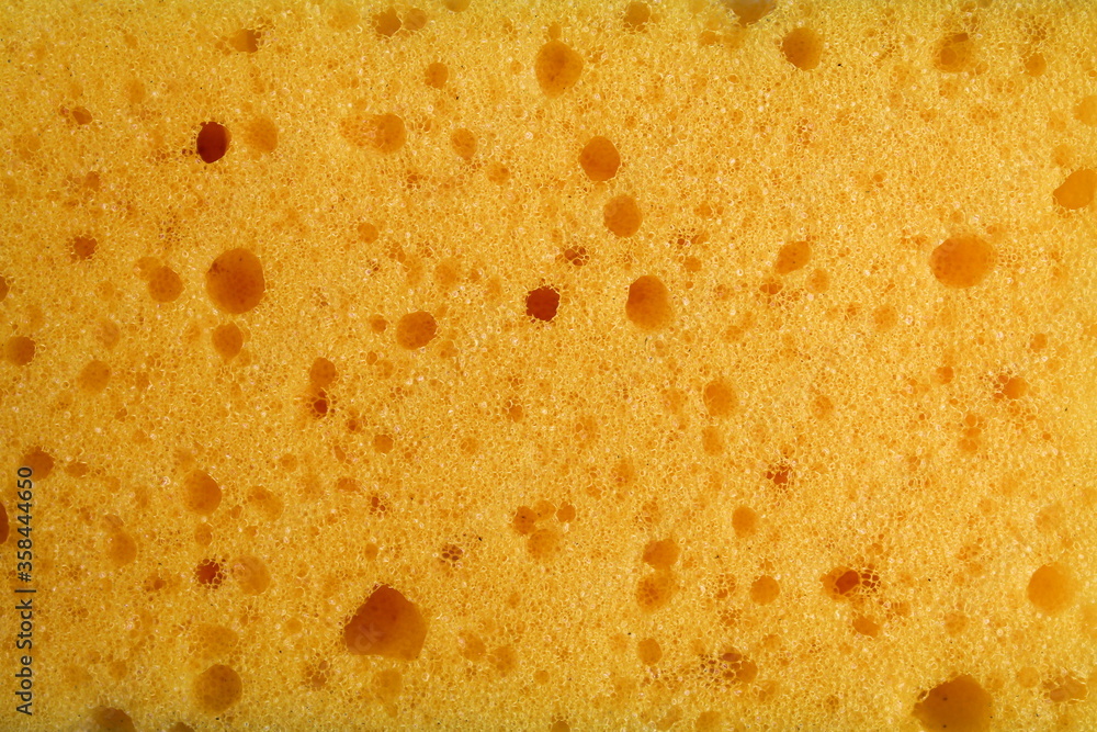 Yellow sponge texture with different round holes