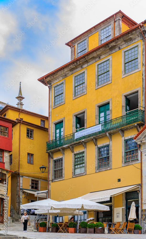 Traditional colorful house facades in the famous Ribeira neighborhood in Porto, Portugal