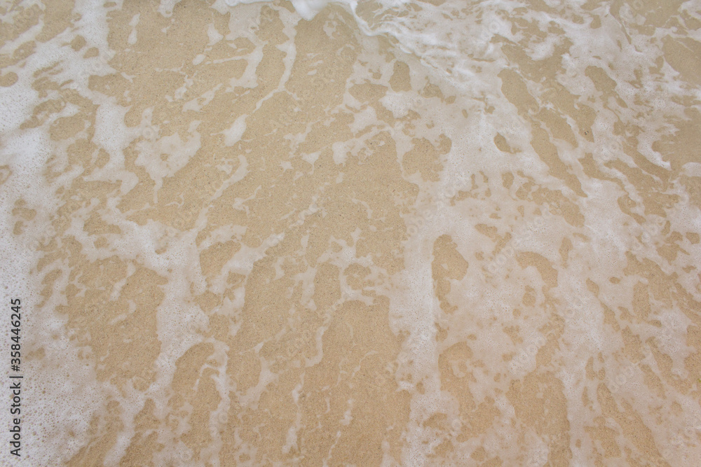 Clear foamy water on the beach Clear foamy water on the beach