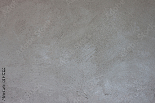 Fényképezés Textured of plastered cement wall is uneven and still wet for background