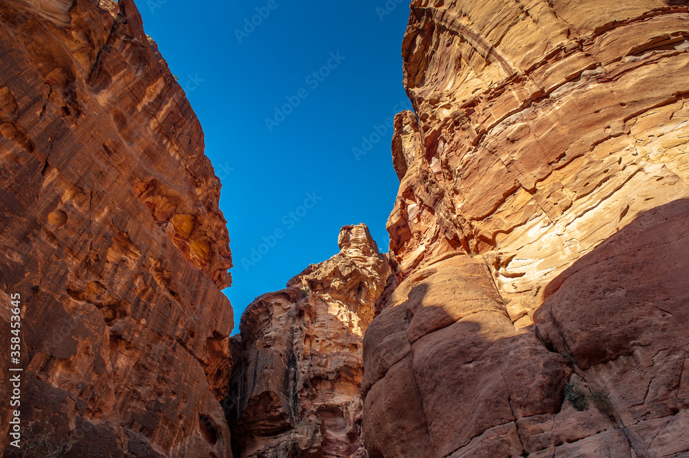 It's Canyon of Petra (Rose City), Jordan. Petra is one of the New Seven Wonders of the World. UNESCO World Heritage