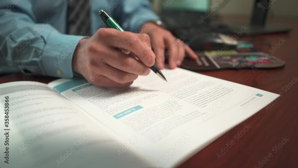 Corporate hands explain brochure at desk Corporate hands explain brochure at desk