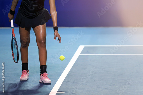 female tennis player with racket and ball © Teran