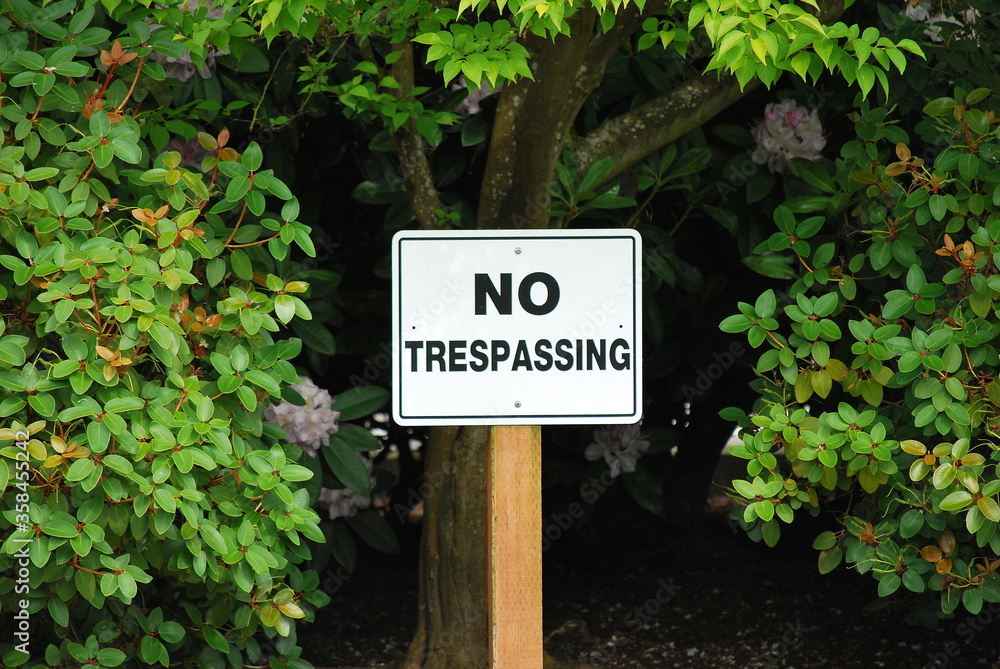 No trespassing sign posted outside.
