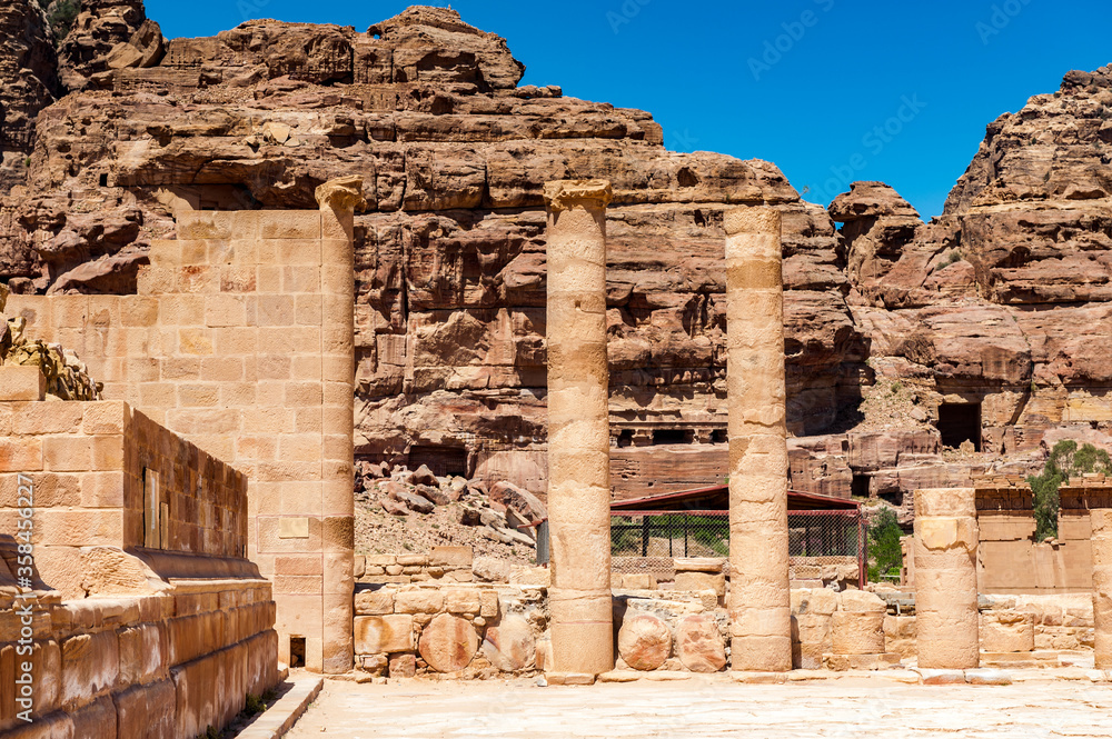 It's Roman columns of the Great temple complex in Petra (Rose City), Jordan. The city of Petra was lost for over 1000 years. Now one of the Seven Wonders of the Word