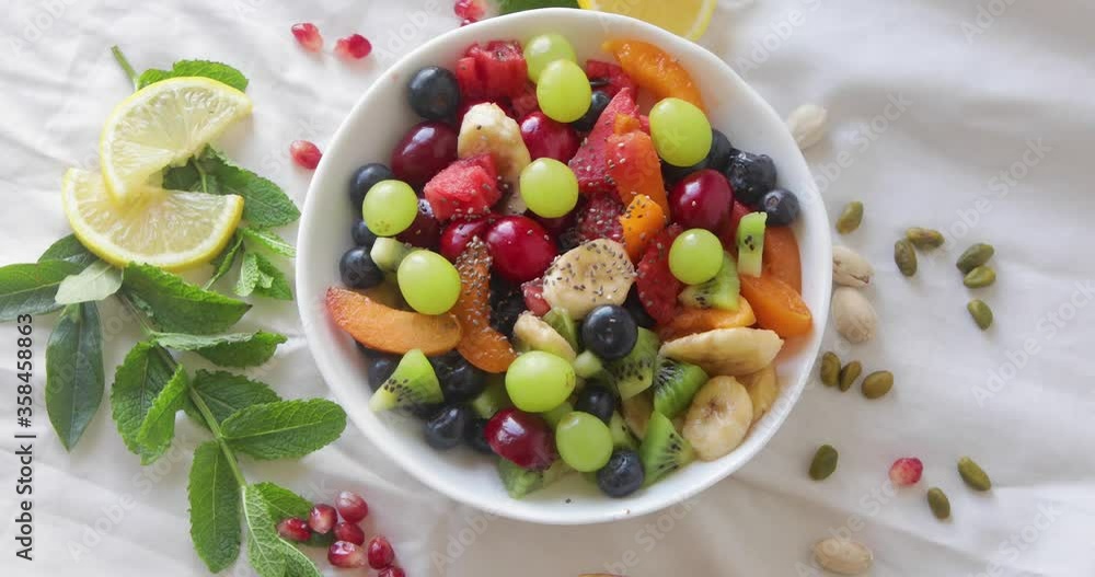 Fruits salad. Healthy eating with vitamins and antioxidants
Fruits salad. Healthy eating with vitamins and antioxidants