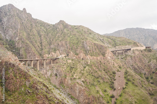 steep mountain road infrastructure with bridges along steep mountain