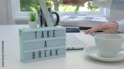 Wallpaper Mural 4k motorized orbit shot of businessman stop working and taking a break in office Torontodigital.ca