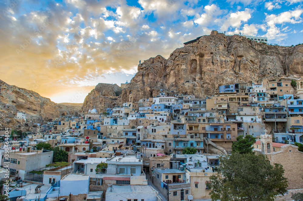 It's Ma'loula or Maaloula, a small Christian village in the Rif Dimashq Governorate in Syria.