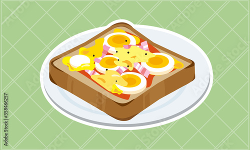 お皿に乗ったゆでたまごとベーコンのピザトースト.