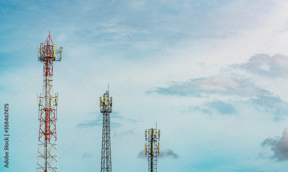 Telecommunication tower with blue sky and white clouds. Antenna on blue sky. Radio and satellite pole. Communication technology. Telecommunication industry. Mobile or telecom 4g network. Technology Telecommunication tower with blue sky and white clouds. Antenna on blue sky. Radio and satellite pole. Communication technology. Telecommunication industry. Mobile or telecom 4g network. Technology