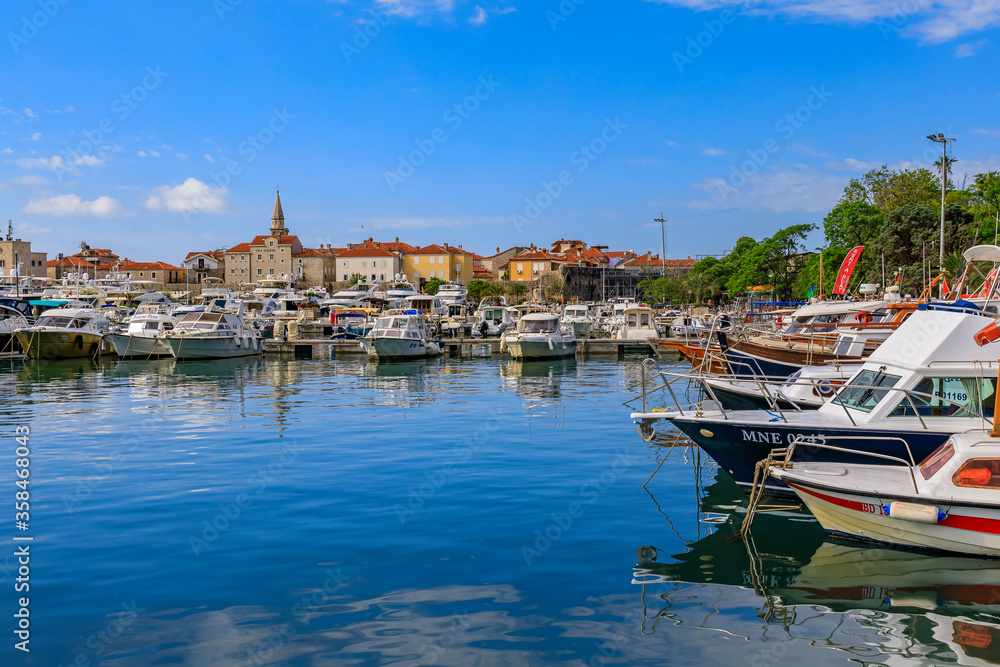 Boats in the port and marina by the Old town in Budva Montenegro on the Adriatic Sea