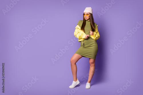 Full length body size view of her she nice attractive lovely fashionable stunning slim fit thin slender sporty girl posing isolated over bright vivid shine vibrant lilac purple violet color background
