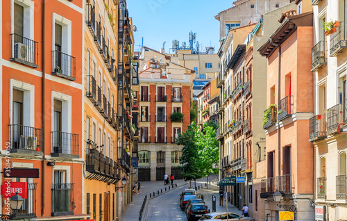 Beautiful traditional residential buildings with metal balconies in the streets of the city center in Madrid, Spain © SvetlanaSF