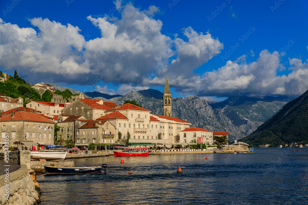 Fototapeta premium Scenic view of the postcard perfect historic town of Perast in the Bay of Kotor on a sunny day in the summer, Montenegro