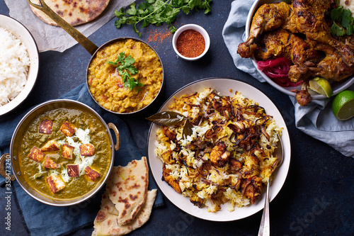 Indian cuisine dinner: tandoori chicken, biryani