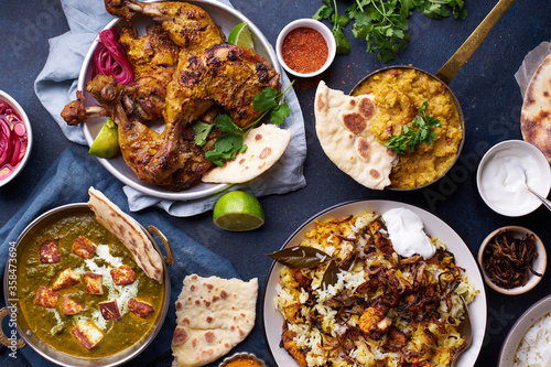 Indian cuisine dinner: tandoori chicken, biryani