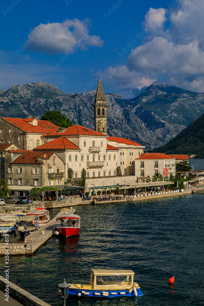 Scenic view of the postcard perfect historic town of Perast in the Bay of Kotor on a sunny day in the summer, Montenegro