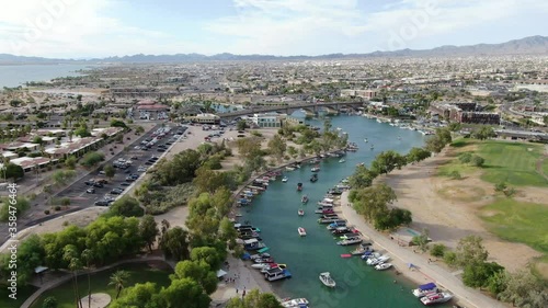 Wallpaper Mural London Bridge resort at Lake Havasu drone 4K aerial footage shows a cinematic party scene of boats driving on a channel in Arizona and California partying with friends and family during sunny summer. Torontodigital.ca