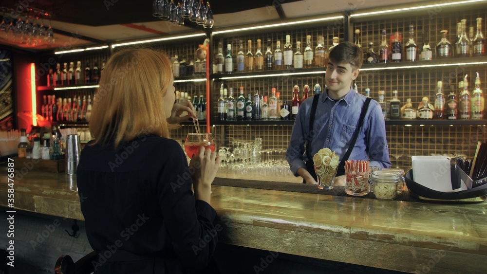 custom made wallpaper toronto digitalSmiling bartender pouring beverages and talking to cheerful visitor in bar