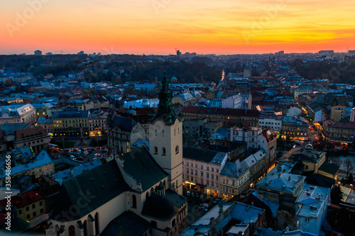 Aerial view of Latin cathedral and Rynok square in Lviv  Ukraine at sunset. View from Lviv town hall