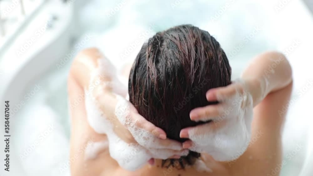 woman spa wash hair in bathtub for relax and stress relief luxury lifestyle woman spa wash hair in bathtub for relax and stress relief luxury lifestyle