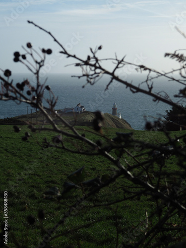 Photography Baily lighthouse in Ireland near Dublin, peninsula sea