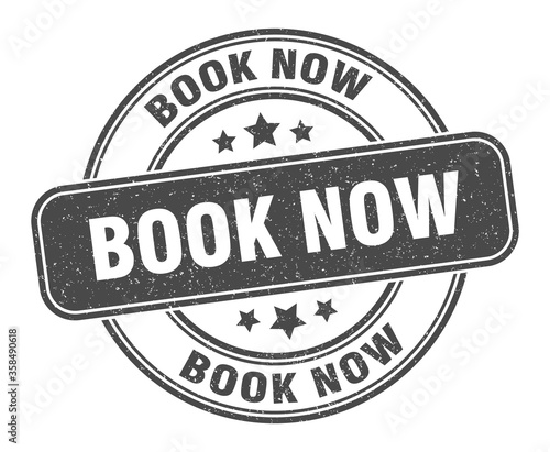 book now stamp. book now label. round grunge sign