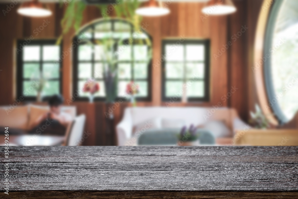 Empty wooden table space platform and blurred restaurant or coffee shop background for product display montage. Empty wooden table space platform and blurred restaurant or coffee shop background for product display montage.