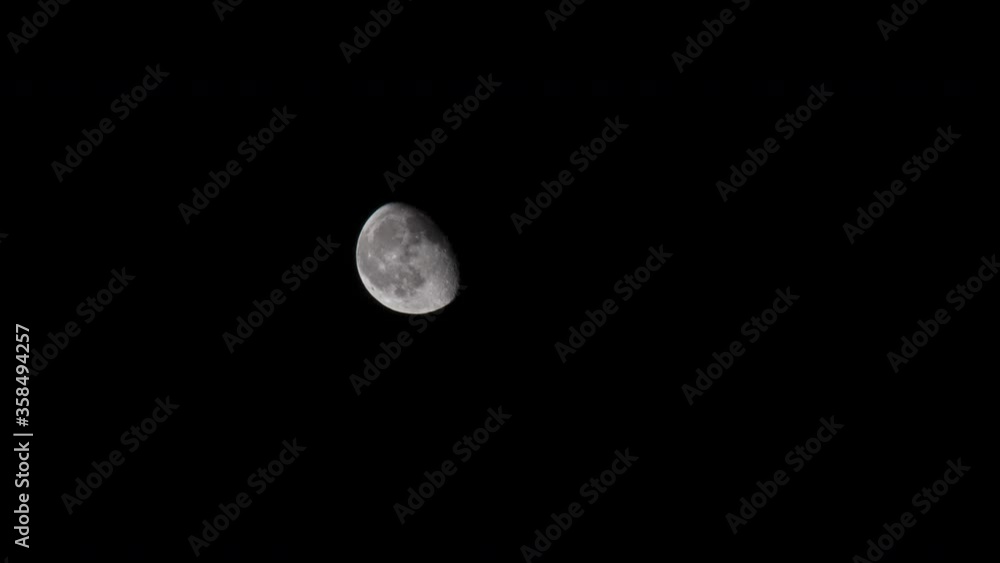 Clear Moon moving across the night sky close up telephoto Clear Moon moving across the night sky close up telephoto