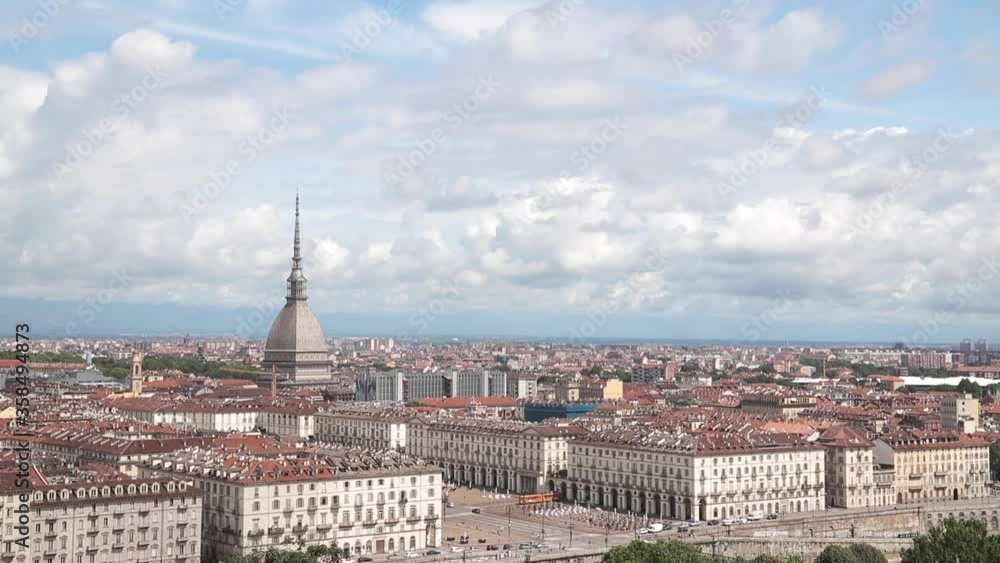 Turin, Italy, Mole Antonelliana and Vittorio square view from hill in a cloudy day Turin, Italy, Mole Antonelliana and Vittorio square view from hill in a cloudy day
