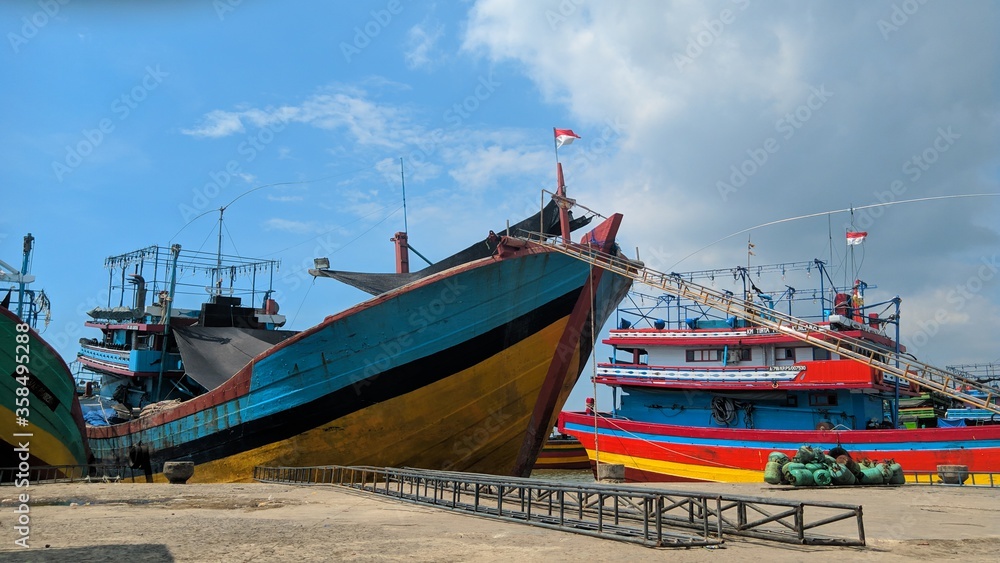 fishing boats in the harbor fishing boats in the harbor