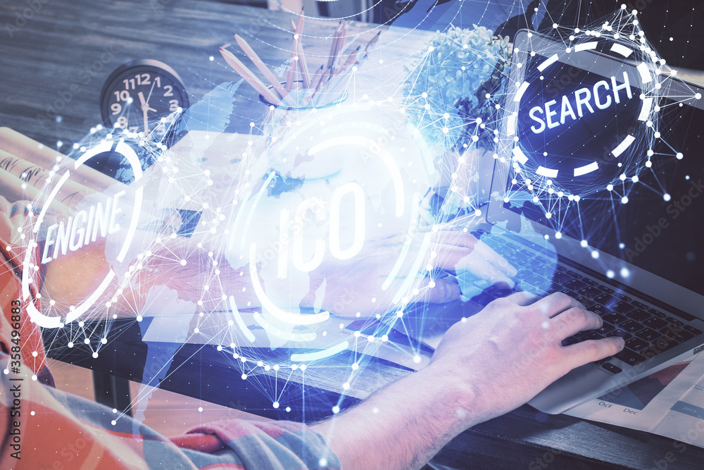 Crypto currency theme hologram with businessman working on computer on background. Concept of blockchain. Multi exposure. Crypto currency theme hologram with businessman working on computer on background. Concept of blockchain. Multi exposure.