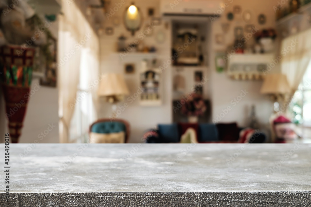 Wooden table space platform and blurred restaurant or coffee shop background for product display montage.