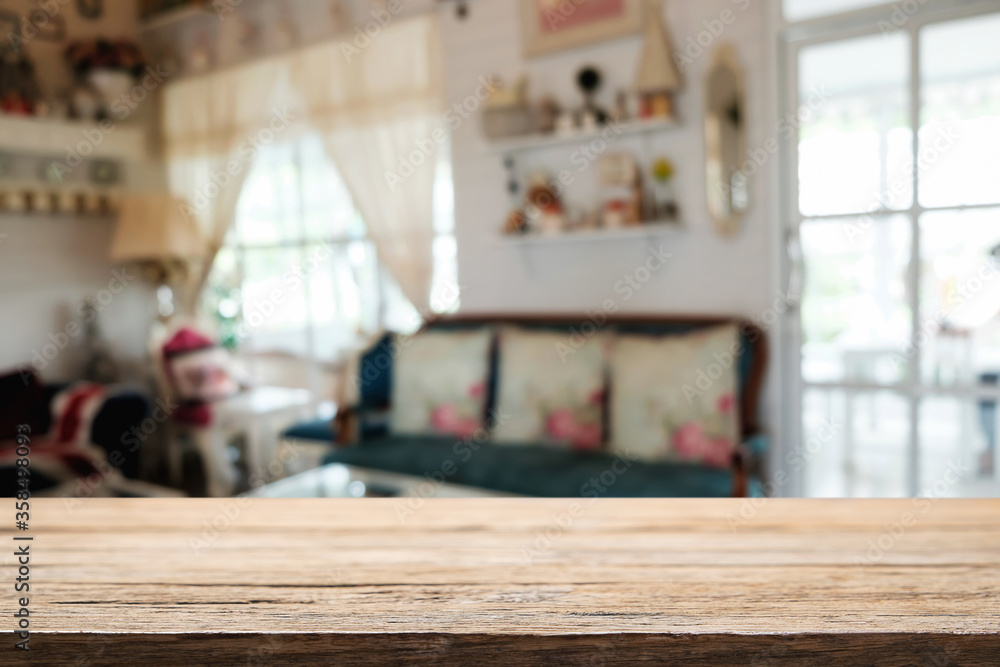 Empty wooden table space platform and blurred restaurant or coffee shop background for product display montage. Empty wooden table space platform and blurred restaurant or coffee shop background for product display montage.