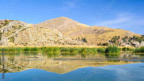 It's Panorama of the mountains ana the lake Titicaca in Peru