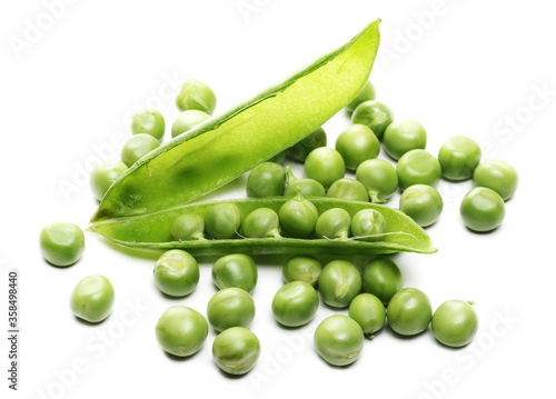 Green peas with pods isolated on white background