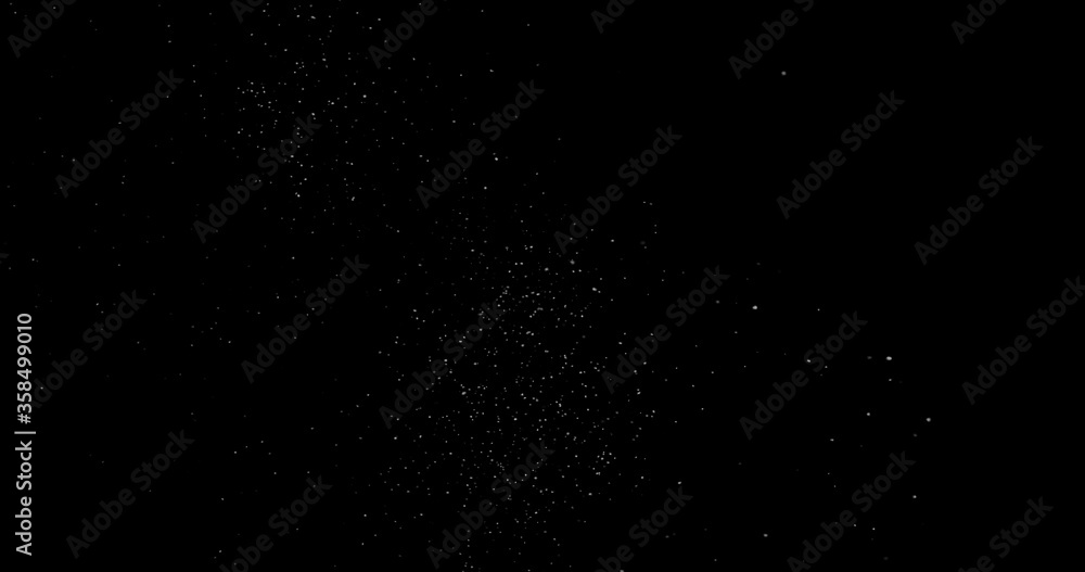 abstract Flying dust particles on a black background