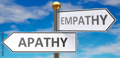 Photos Apathy and empathy as different choices in life - pictured as words Apathy, empathy on road signs pointing at opposite ways to show that these are alternative options