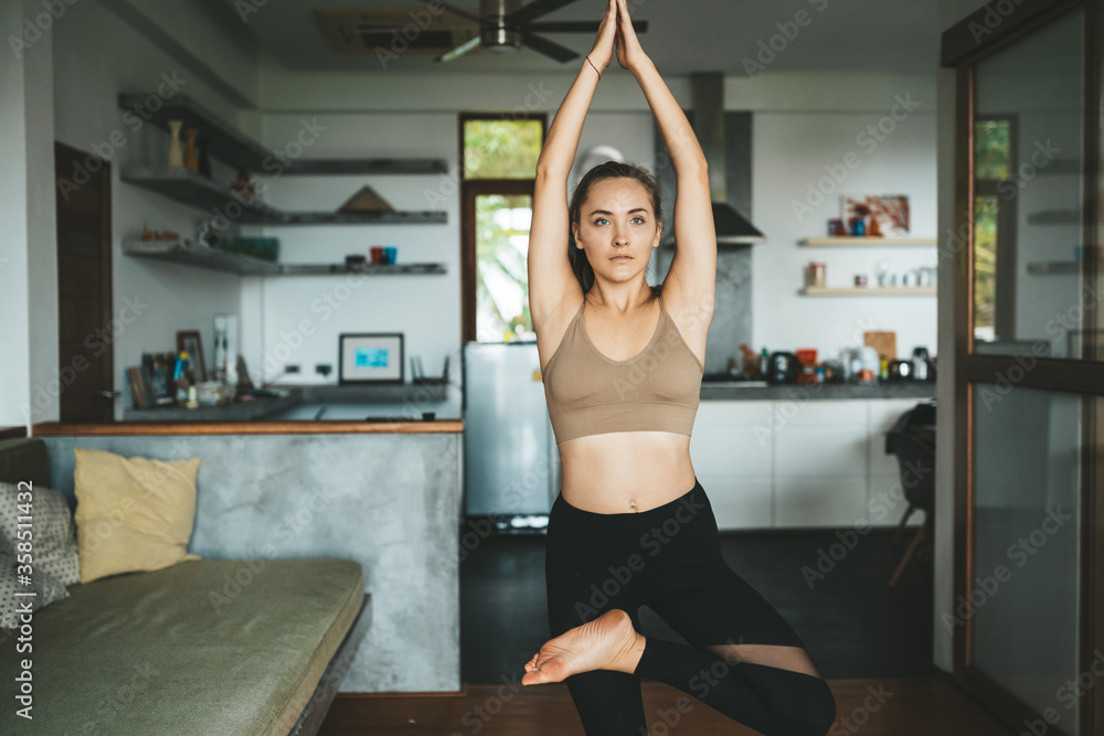 Woman practicing home yoga. Meditation. Woman practicing home yoga. Meditation.