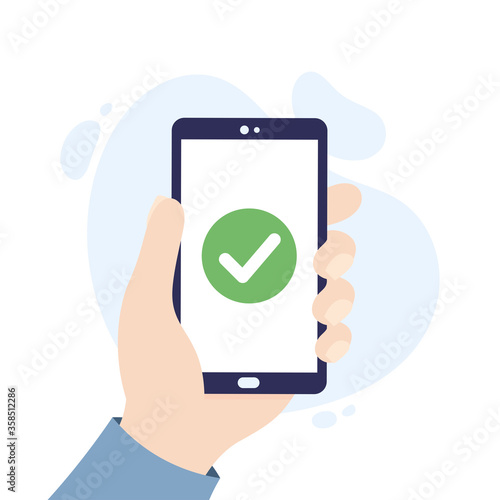 Smartphone with check mark icon. Approved payment/transaction. Hand holding a smartphone.
