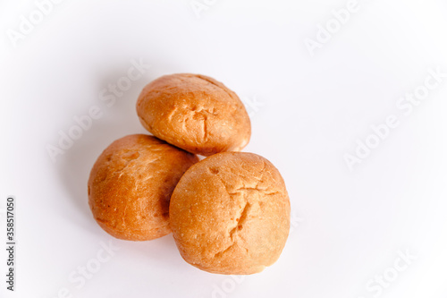 Heap of buns with sesame isolated on the white background
