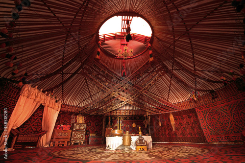 Interior of a nomadic yurt in the city of Turkestan, in Kazakhstan photo