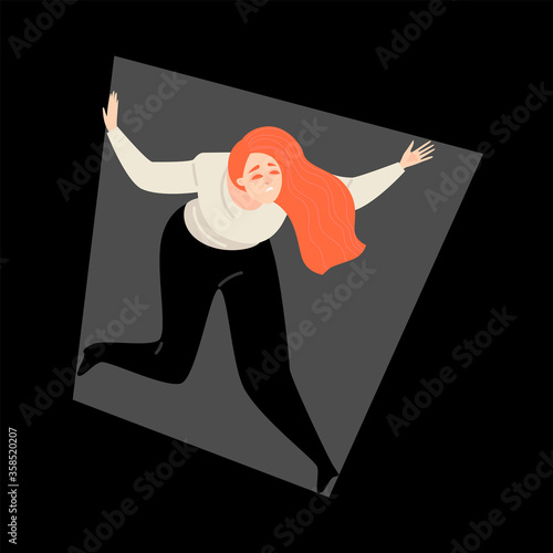 Frightened girl in a cramped space standing in an uncomfortable position. The concept of claustrophobia.