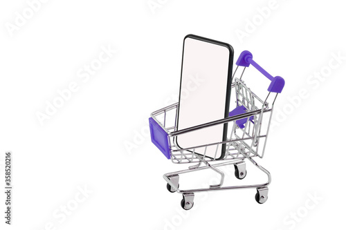 shopping cart with smartphone on white background, online shopping concept.