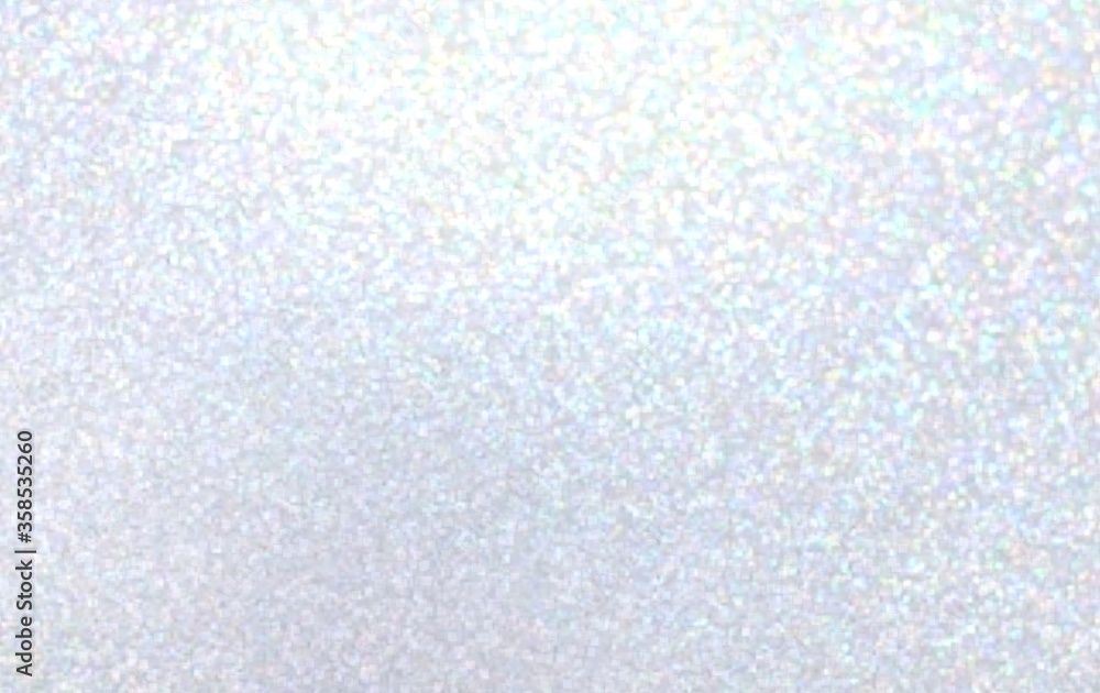 Light blue background decorative iridescent brilliance glitter. Winter holiday decorative blur texture. 