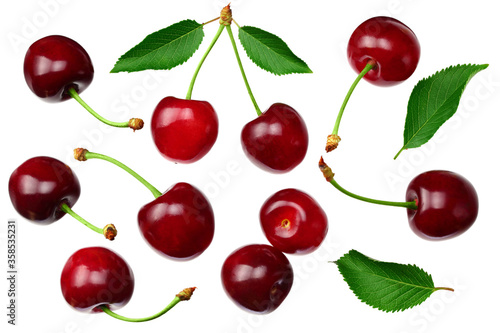 cherry with green leaf isolated on white background. Top view